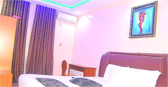 /web/uploads/116/Gold Rush Suites (Formerly Davok Suites)/room-photos/Exquisite Room/exquisite_roll_bg1.jpg